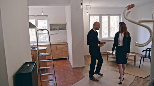 istock Two Real Estate agents meeting 1082357816