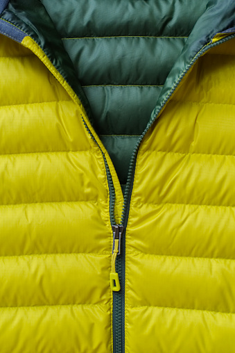 The zipper of a jacket.