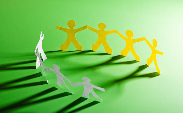 istock Paper people in teamworking concept. 1082364434