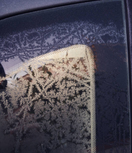 istock Frost with beautiful shapes on a car door 1082366222