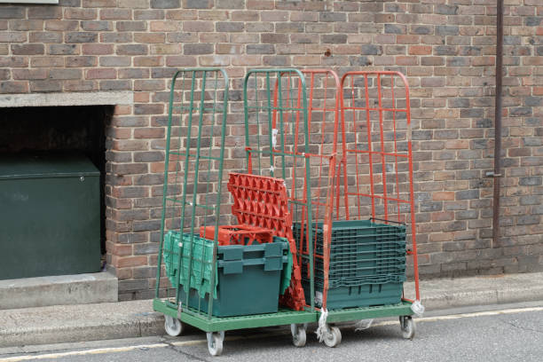 istock green and red carts and crates 1082366232