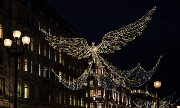 istock Christmas angels above the street 1082385962