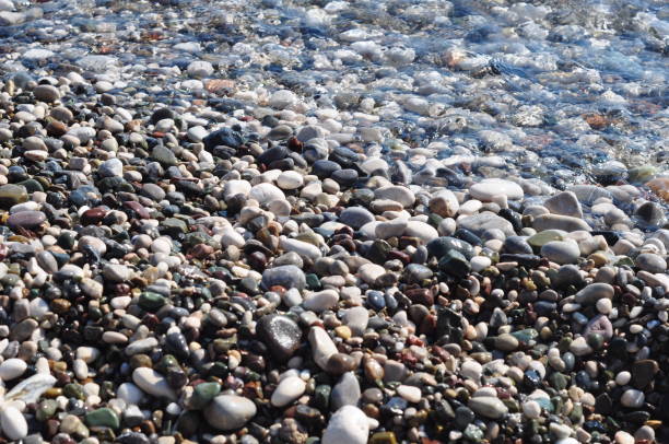 istock High Angle View Of Stones On Shore At Beach 1082386436