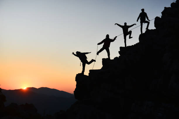 istock mountaineering activities and climbing success 1082389224