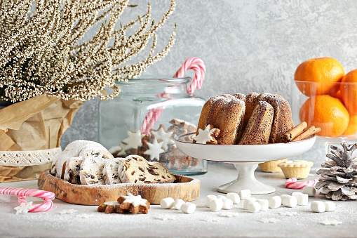 Christmas festive dessert table with traditional cakes and sweets