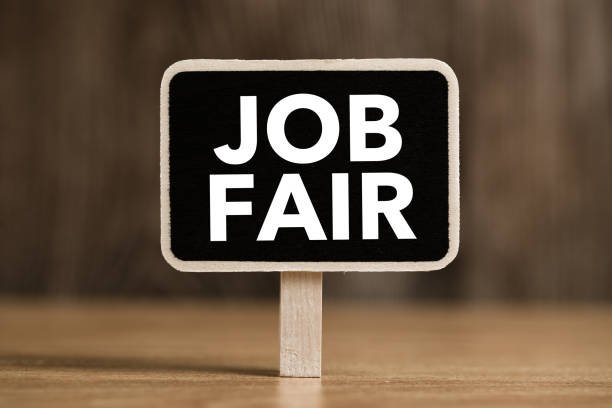 istock Job Fair Text On Blackboard Sign Board 1082393084