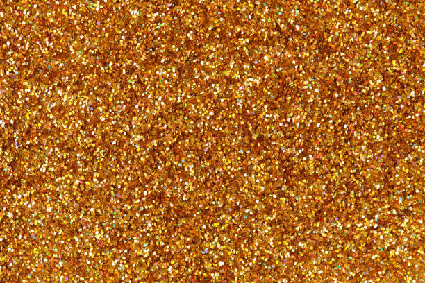 istock Abstract orange, gold glitter background on macro. 1082405100