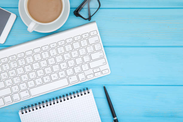 istock Office desk table of Business workplace and business objects 1082405280