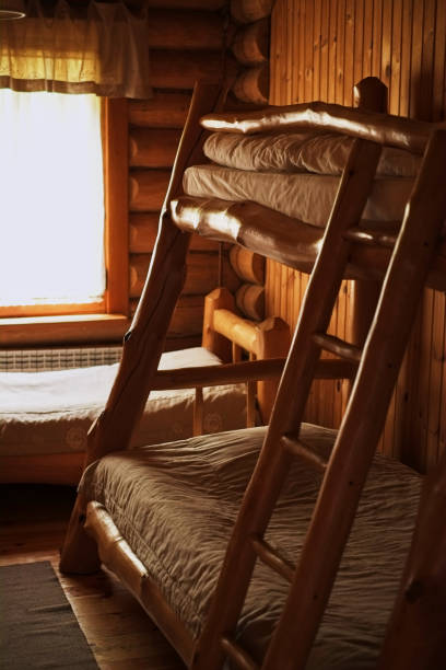 istock Bunk wooden beds in a hostel wooden room 1082406754