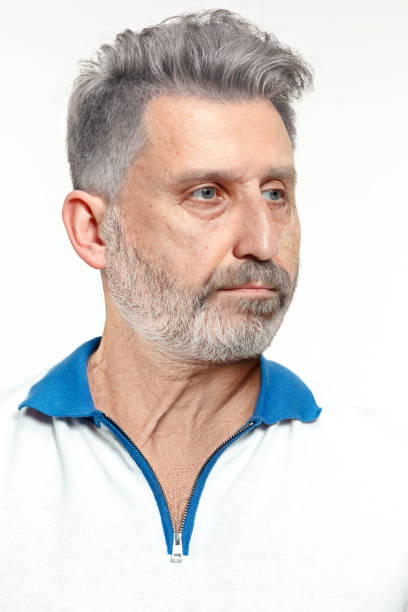 istock Senior adult male face with serious expression. Studio portrait 1082408566