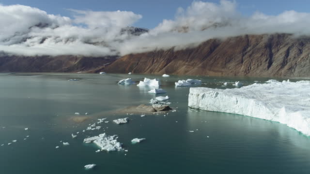 Drone Footage Of A Glacier Front With Icebergs In The Fjord, Aerial Drone Footage, Greenland Glacier, Climate Change