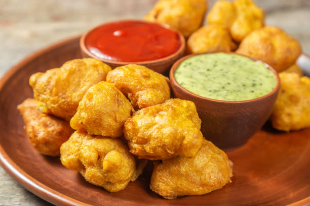 istock Pacora. Popular Indian vegetarian fast food. 1082421408