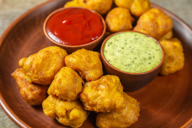 istock Pacora. Popular Indian vegetarian fast food. 1082421452
