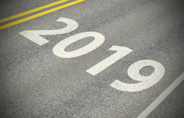 istock Heading for 2019,  sign, road marking 1082421976