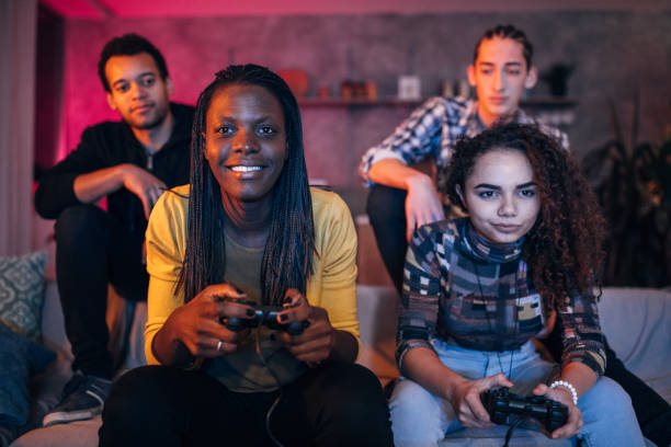 istock Friends playing video games at home 1082422278