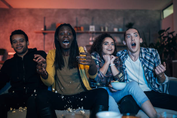 istock Friends watching scary movie 1082424220