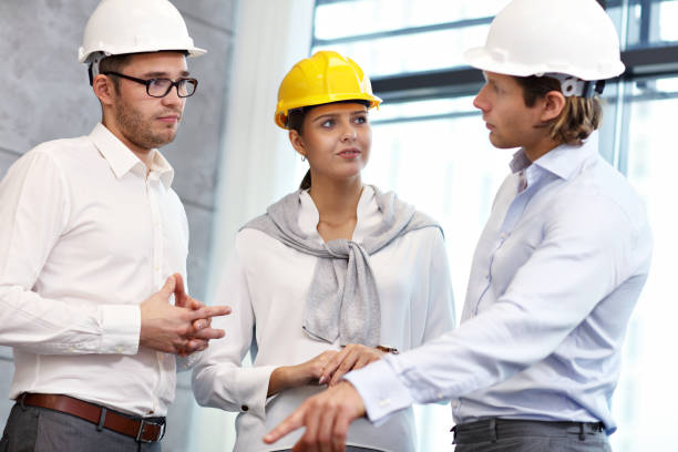 istock Group of architects sharing their ideas 1082426234