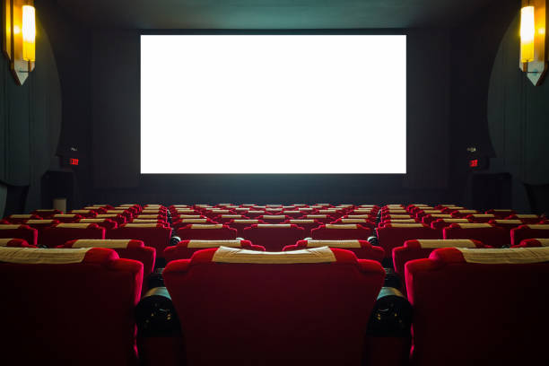 istock Cinema hall with red seat and wide white screen 1082429518