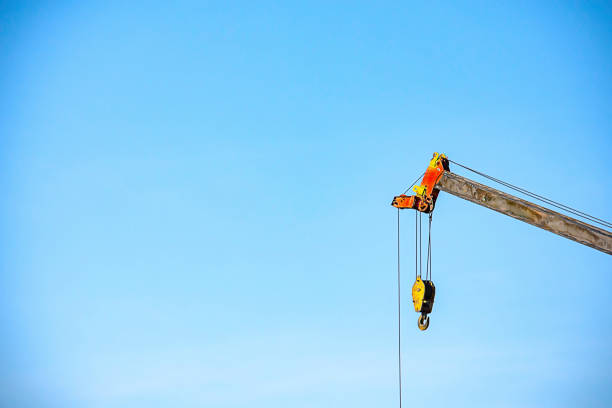 istock Sling and hoist the crane arm The background sky 1082438192