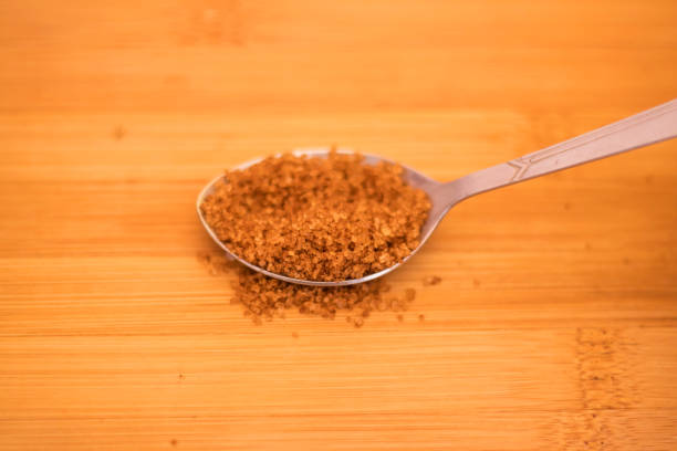 istock Image of brown sugar and white sugar with jaggery 1082442034