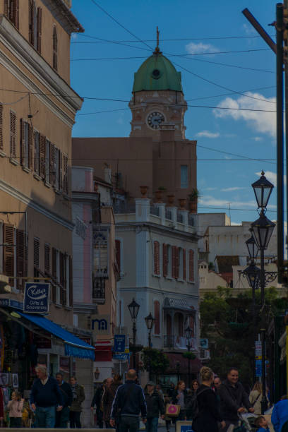 main street and clock tower - editorial concepts and ideas retail place store imagens e fotografias de stock