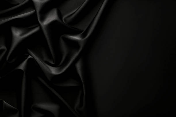 istock Background of black satin fabric 1082444640