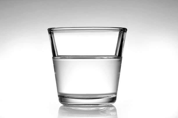 Glass of Water on Wood Table