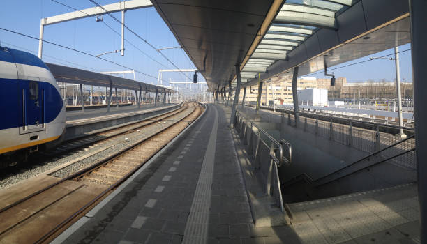 istock Panorama Utrecht railroad station platform with sprinter train 1082455304