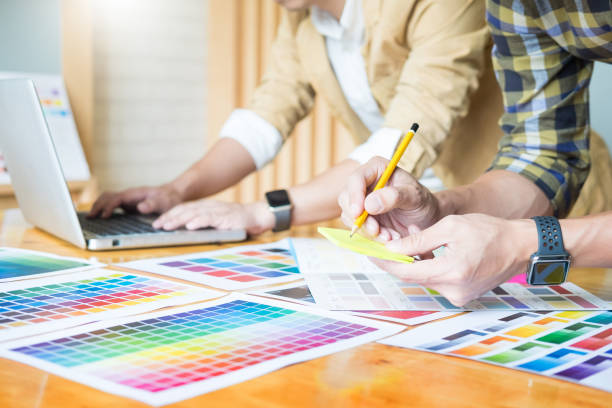 istock Creative Occupation People Holding Color Swatch On Table 1082461098