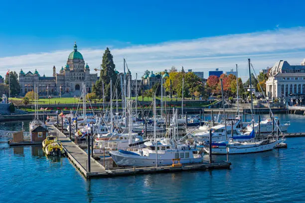 Photo of Victoria Harbor with the British Columbia Parliament Building Victoria British Columbia Canada