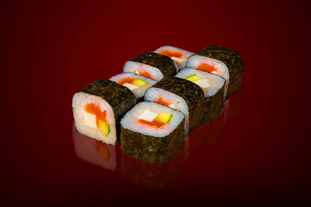istock Japanese sushi on a dark background 1082465716