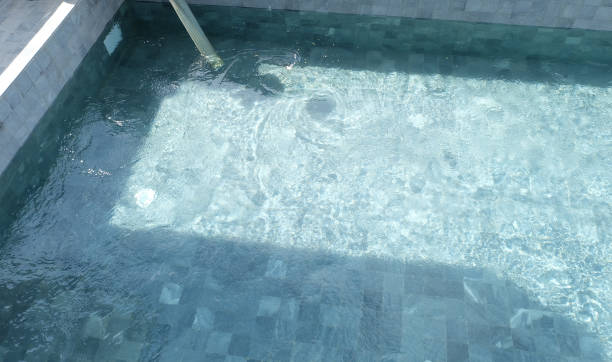 istock Fill the swimming pool with clean water. 1082465884