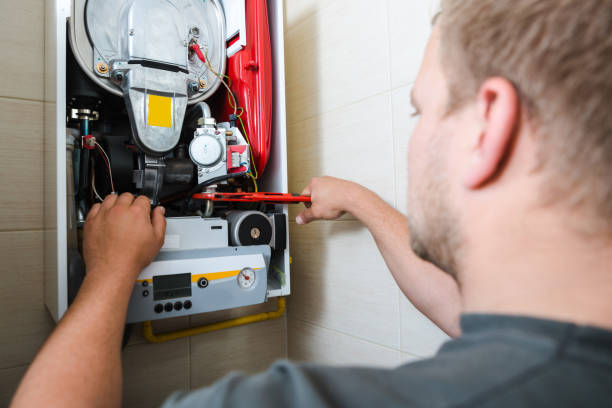 istock Technician repairing Gas Furnace 1082467404