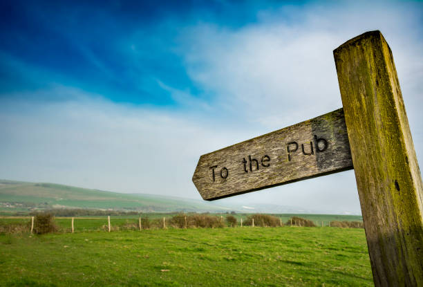 istock To the pub sign in rural setting 1082468186