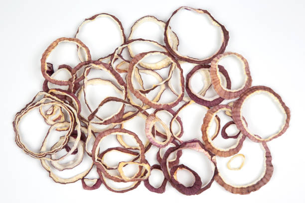 istock Dried salad onion slices on white background 1082474916