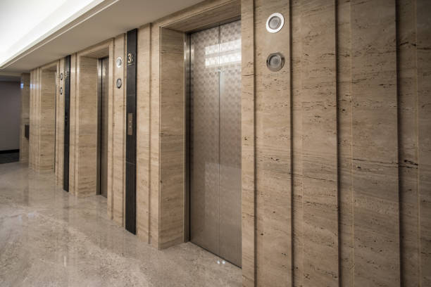 istock Lift lobby with marble wall panels without people. 1082479622