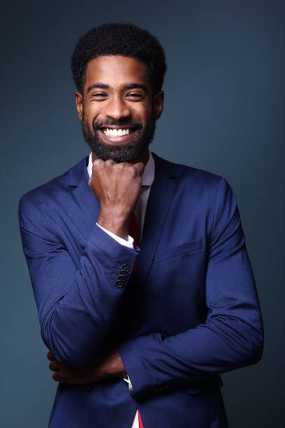 istock Beautiful black man in front of a colored background 1082486562