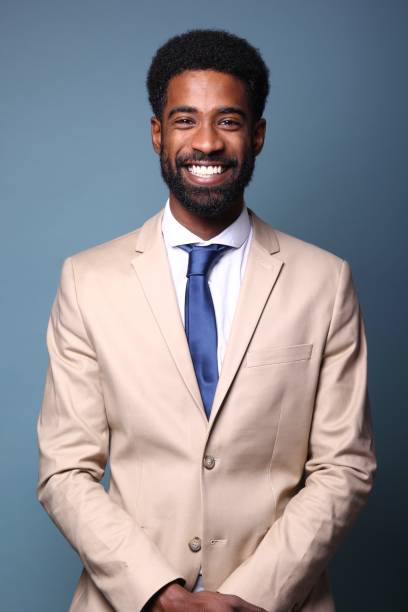 istock Beautiful black man in front of a colored background 1082486602