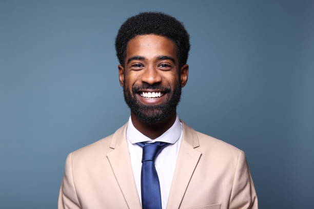istock Beautiful black man in front of a colored background 1082486674