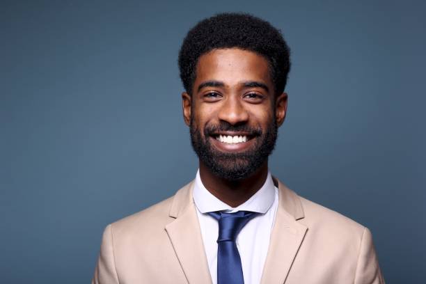 istock Beautiful black man in front of a colored background 1082486714