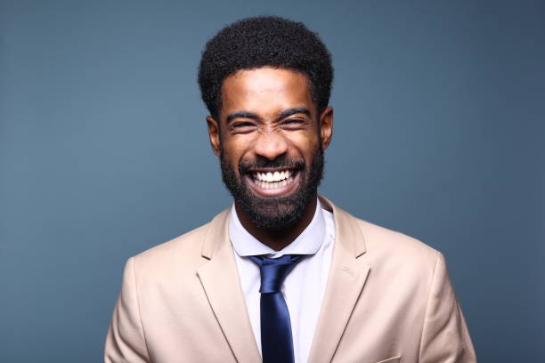 istock Beautiful black man in front of a colored background 1082486752