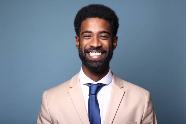 istock Beautiful black man in front of a colored background 1082486770