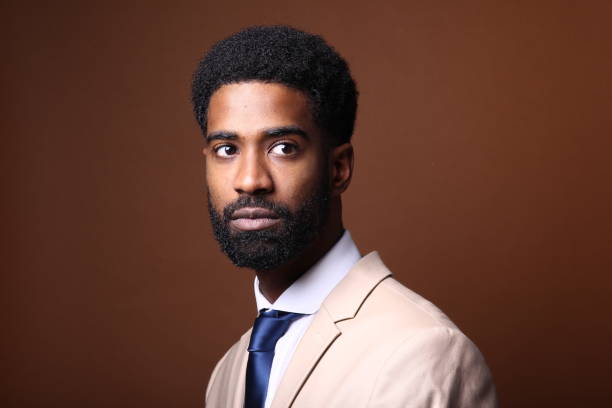 istock Beautiful black man in front of a colored background 1082486798