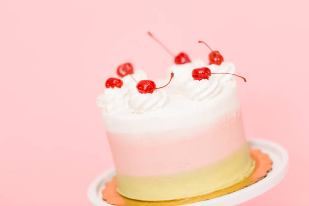 istock Birthday Spumoni cake on pink background. 1082487042