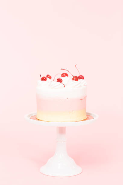istock Birthday Spumoni cake on pink background. 1082487076
