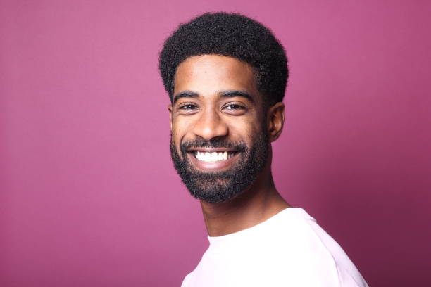 istock Beautiful black man in front of a colored background 1082487810