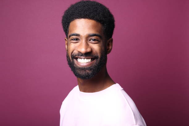 istock Beautiful black man in front of a colored background 1082487824