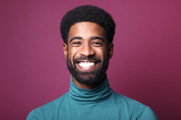 istock Beautiful black man in front of a colored background 1082487836