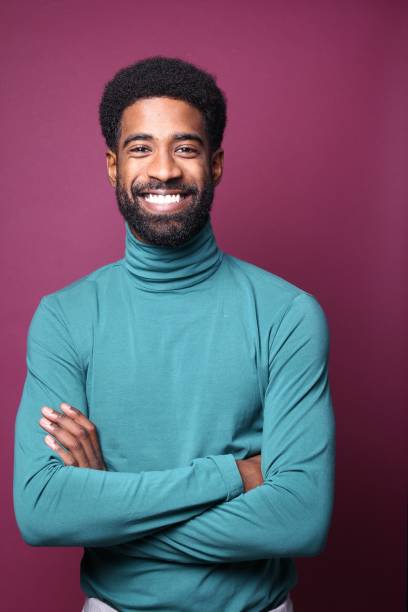 istock Beautiful black man in front of a colored background 1082487848