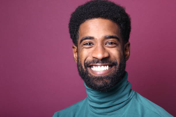 istock Beautiful black man in front of a colored background 1082487866